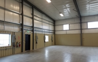 Interior view of a recently completed steel warehouse building